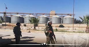 صورة الجيش الوطني المدعوم من تركيا يبيع صوامع الحبوب في رأس العين بسوريا