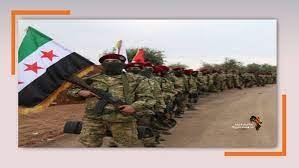 صورة 250 مقاتلاً سورياً يصلون ليبيا مقابل رشوة قادتهم.